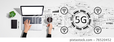 5G network with person using laptop computer 5G network with person using laptop computer 76520452