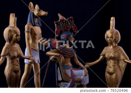 Still life with egyptian figures pharaoh, anubis 76520496