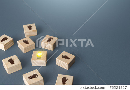 One glowing light bulb among many off. Choose the best idea. Investment in a promising successful startup technologies. Search for talents. First of all, fast response and feedback. Useful advice, FAQ 76521227