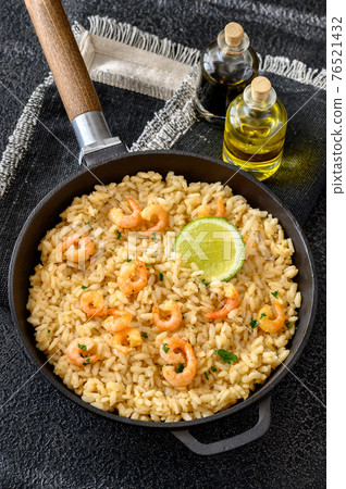Portion of risotto with prawn Portion of risotto with prawn 76521432