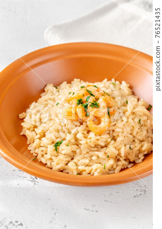 Portion of risotto with prawn Portion of risotto with prawn 76521435