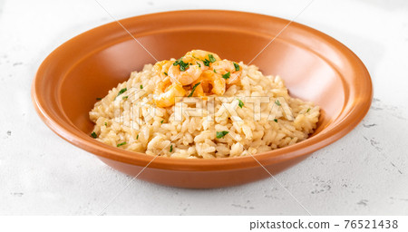 Portion of risotto with prawn Portion of risotto with prawn 76521438
