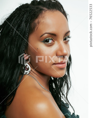 young pretty african american woman isolated on white background happy smiling, wearing bright shawl and jewelry, lifestyle people concept young pretty african american woman isolated on white background happy smiling, wearing bright shawl and jewelry, lifestyle people concept 76522533