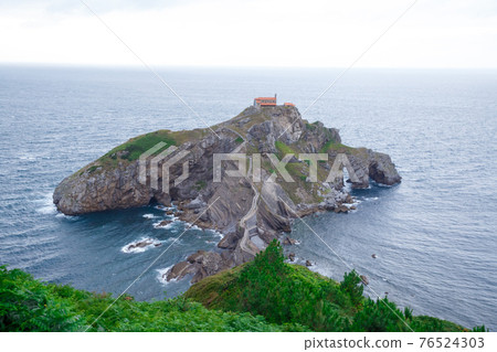 San Juan de Gastelugache island with a chapel Doniene Gaztelugatxeko, Basque Country, Spain 76524303