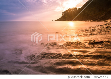 Unusual rock formations turbidites, seashore at sunset, Basque Country Unusual rock formations turbidites, seashore at sunset, Basque Country 76524437