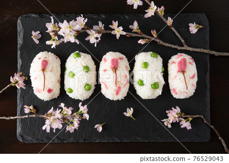 Salted cherry blossoms and green peas spring rice balls Salted cherry blossoms and green peas spring rice balls 76529043