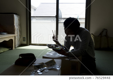 Men eating lunch in the room Men eating lunch in the room 76529448