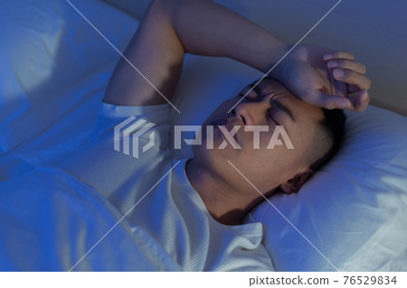 asian man has insomnia 76529834