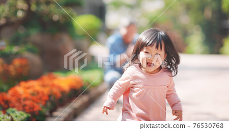 asian senior man with granddaughter 76530768