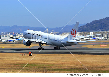 Osaka International Airport JAL Airplane Takeoff 76530958