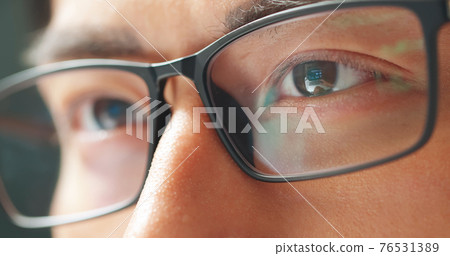 male eye wearing eyeglasses male eye wearing eyeglasses 76531389