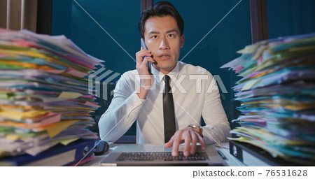 businessman overtime work 76531628