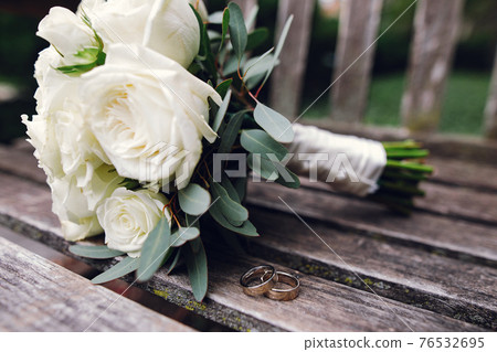 wedding couple walking in the park near the university in chicago 76532695