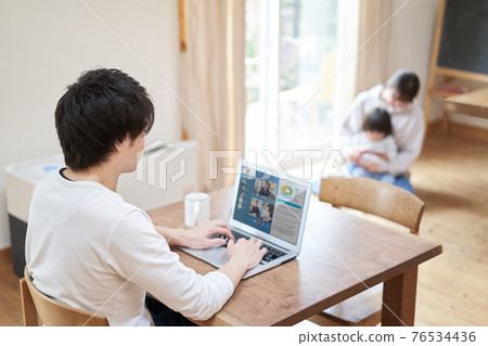 Asian men having an online meeting on telework Asian men having an online meeting on telework 76534436