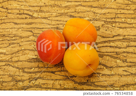 Fresh ripe sweet few apricots Fresh ripe sweet few apricots 76534858