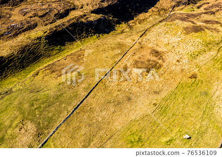 Aerial view of Dunmore Head by Portnoo in County Donegal, Ireland. Aerial view of Dunmore Head by Portnoo in County Donegal, Ireland. 76536109