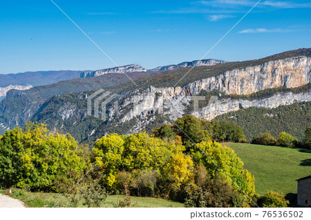 French countryside. Saint Jean en Royans: view of the heights of the Vercors, the marly hills and the Val de Drome. French countryside. Saint Jean en Royans: view of the heights of the Vercors, the marly hills and the Val de Drome. 76536502