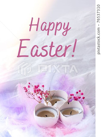 HAPPY EASTER lettering greeting card text. Composition of White egg shell with candle inside. Bright easter decorations with bird feathers. Pastel colors. HAPPY EASTER lettering greeting card text. Composition of White egg shell with candle inside. Bright easter decorations with bird feathers. Pastel colors. 76537310
