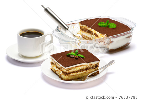 Traditional Italian Tiramisu dessert in glass baking dish, portion on plate and cup of coffee isolatet on white background 76537783
