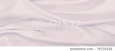 Smooth elegant pink silk or satin texture as wedding background. Luxurious background design Smooth elegant pink silk or satin texture as wedding background. Luxurious background design 76538188
