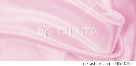 Smooth elegant pink silk or satin texture as wedding background. Luxurious background design Smooth elegant pink silk or satin texture as wedding background. Luxurious background design 76538192