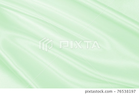 Smooth elegant green silk or satin luxury cloth texture as abstract background. Luxurious background design 76538197
