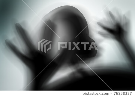 Silhouette of spooky alien and bright light on behind him Silhouette of spooky alien and bright light on behind him 76538357