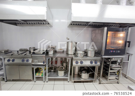 Interior of empty kitchen of restaurant there is not anyone 76538524