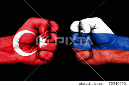 Conflict between Turkey and Russia - male fists Conflict between Turkey and Russia - male fists 76540050