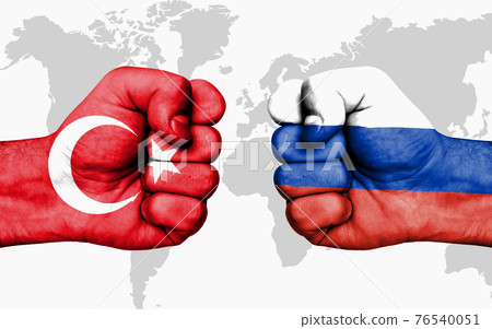 Conflict between Turkey and Russia - male fists 76540051