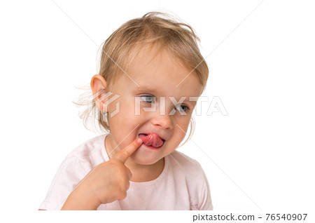 Little baby with finger inside mouth Little baby with finger inside mouth 76540907