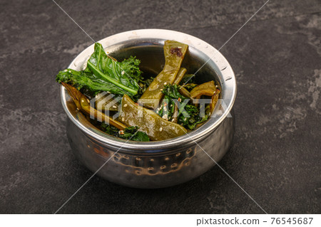 Vagan cuisine with roasted green bean 76545687