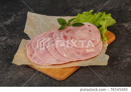 Slised ham snack over board Slised ham snack over board 76545895