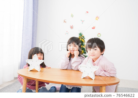 Children decorating Christmas Children decorating Christmas 76546622