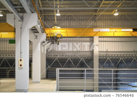 Overhead crane inside factory or warehouse for manufacturing production plant. Overhead crane inside factory or warehouse for manufacturing production plant. 76546648
