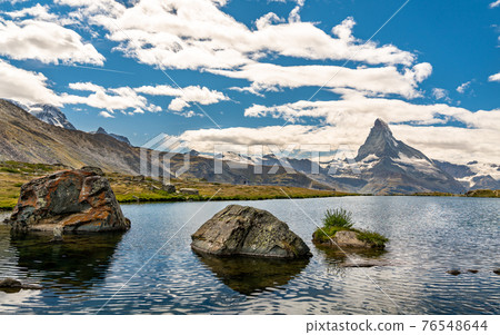 Matterhorn with reflection in Stellisee Lake, Switzerland Matterhorn with reflection in Stellisee Lake, Switzerland 76548644
