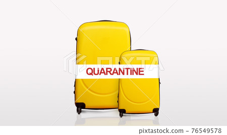 Two yellow baggages over white background, panorama with copy space Two yellow baggages over white background, panorama with copy space 76549578