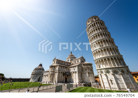 Piazza dei Miracoli in Pisa Tuscany Italy - Leaning Tower Cathedral and the Baptistery Piazza dei Miracoli in Pisa Tuscany Italy - Leaning Tower Cathedral and the Baptistery 76549704