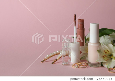 Female concept with different accessories on pink background Female concept with different accessories on pink background 76550943