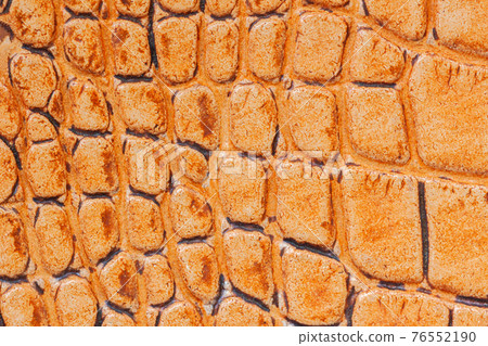 Texture of brown genuine leather embossed Reptile scales, trend pattern, natural background, copy space 76552190