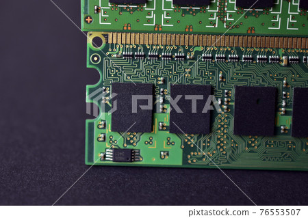 Green computer RAM bars on a black background 76553507