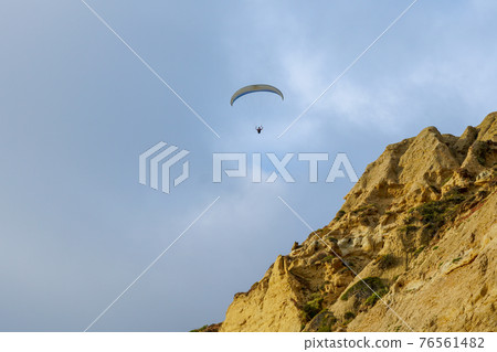 Man doing sport, Para-glider in the clouded sky. Man doing sport, Para-glider in the clouded sky. 76561482