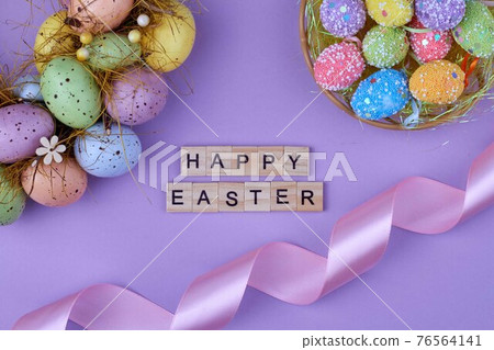 Decorative easter eggs and silk ribbon. Decorative easter eggs and silk ribbon. 76564141