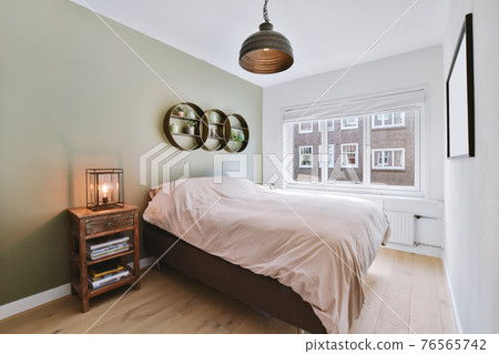 Bedroom with stylish decorations and bed 76565742