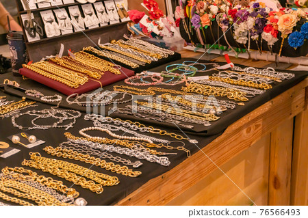 Necklaces and bracelets. Souvenir. Jewelry Souvenir Shop. Colorful jewelry Necklaces and bracelets. Souvenir. Jewelry Souvenir Shop. Colorful jewelry 76566493