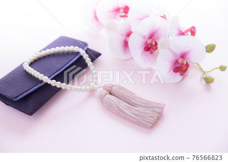 Buddhist altars and Phalaenopsis orchids 76566823