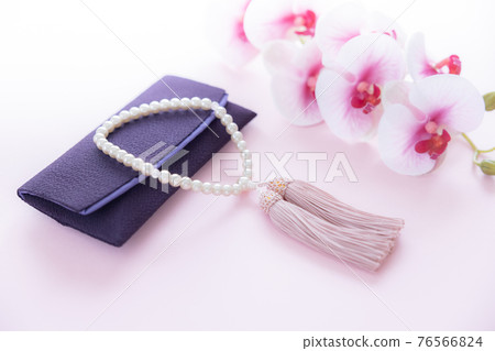 Buddhist altars and Phalaenopsis orchids 76566824