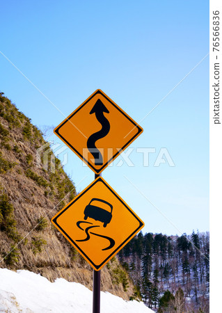 There is a frozen part. Be careful of sharp curves. Road road sign 76566836