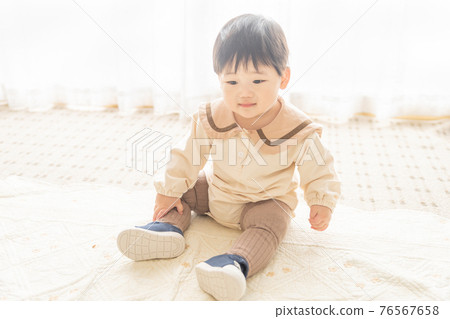 Baby in first shoes Baby in first shoes 76567658