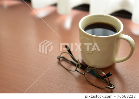 Morning coffee by the window 76568228